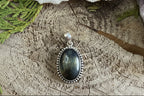 Pendentif oeil de faucon